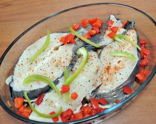 Add a little sweet pepper on top of the fish