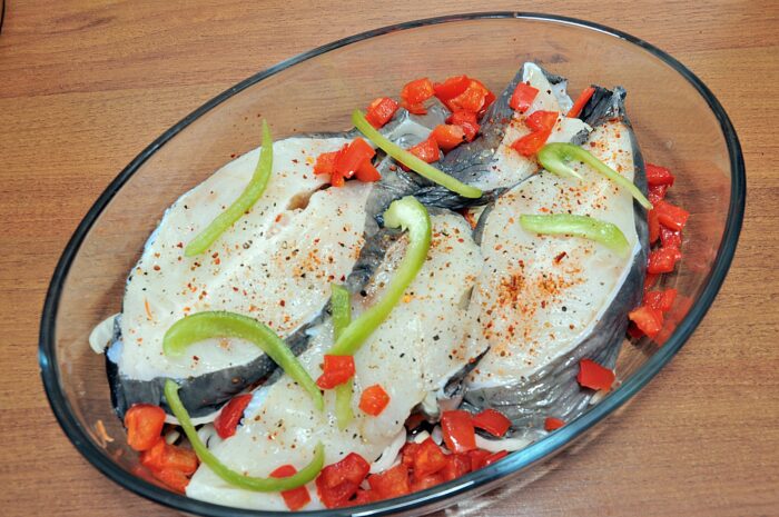 Add a little sweet pepper on top of the fish