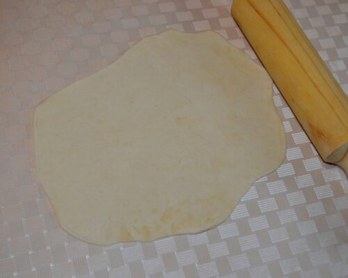 Divide the dough into 4 equal parts