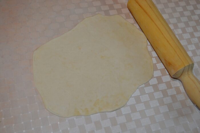 Divide the dough into 4 equal parts