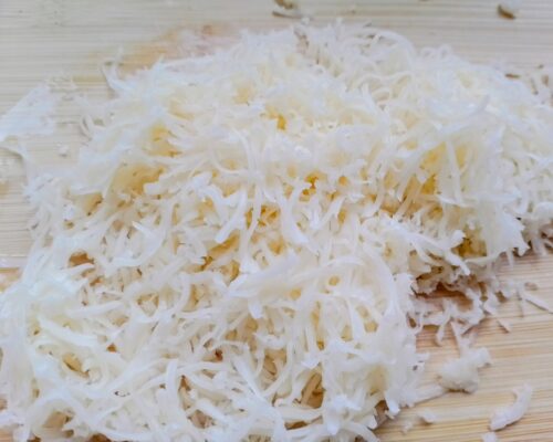 Grate the cheese using a fine grater