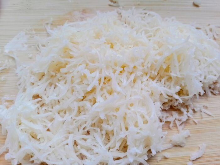 Grate the cheese using a fine grater