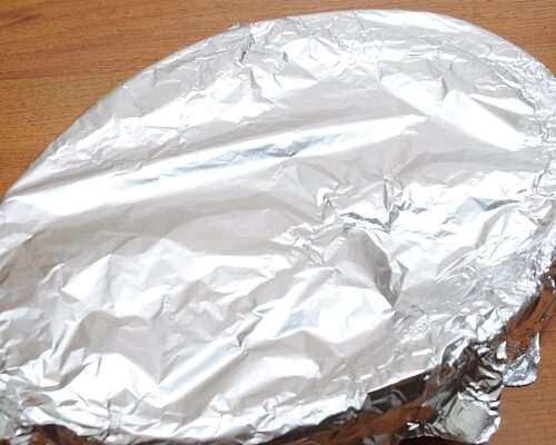 Cover the dish with foil