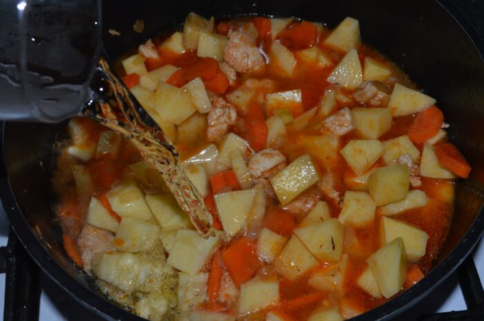 Pour in the water and simmer