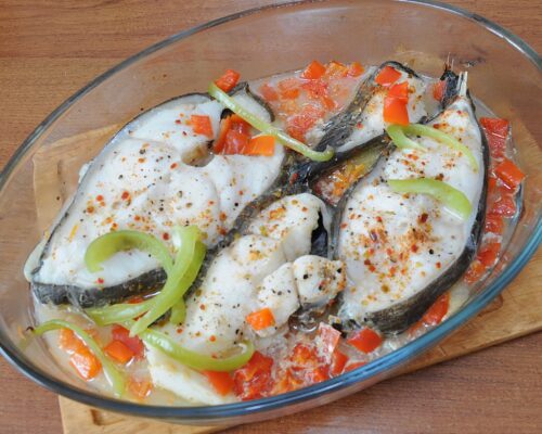 Remove the fish and vegetables from the oven