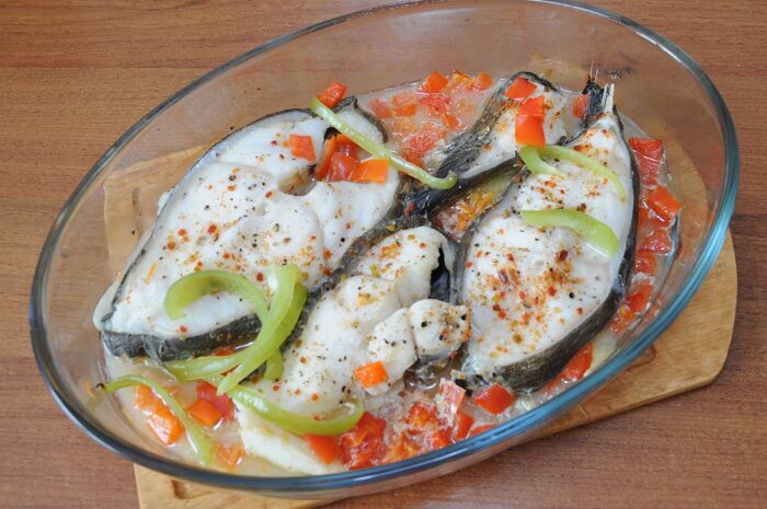 Remove the fish and vegetables from the oven