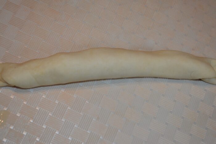 Roll out the dough with the filling