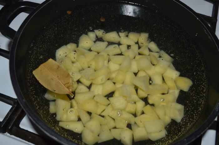 Pour the water into the pot and add the potatoes