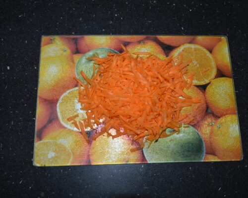 Grate the carrot on a coarse grater