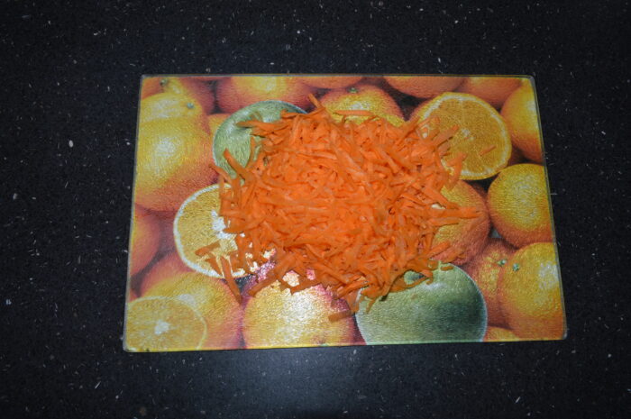 Grate the carrot on a coarse grater