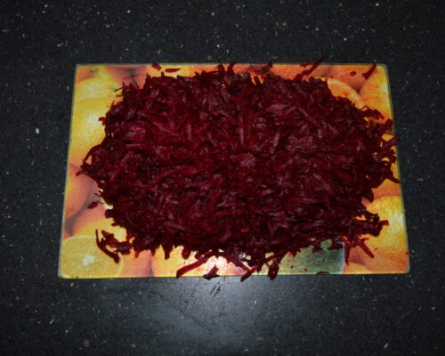 Grate the beetroot on a coarse grater