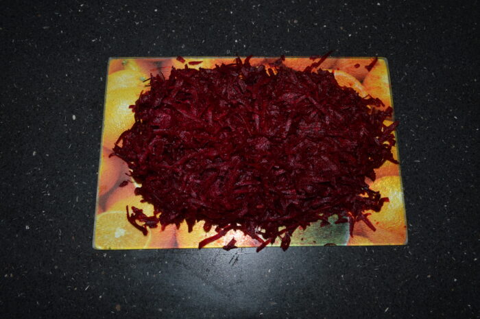 Grate the beetroot on a coarse grater