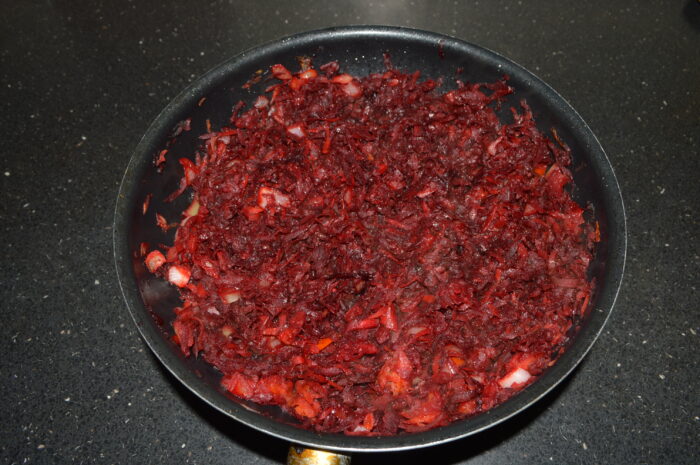 add the mixture of fried vegetables to the pan