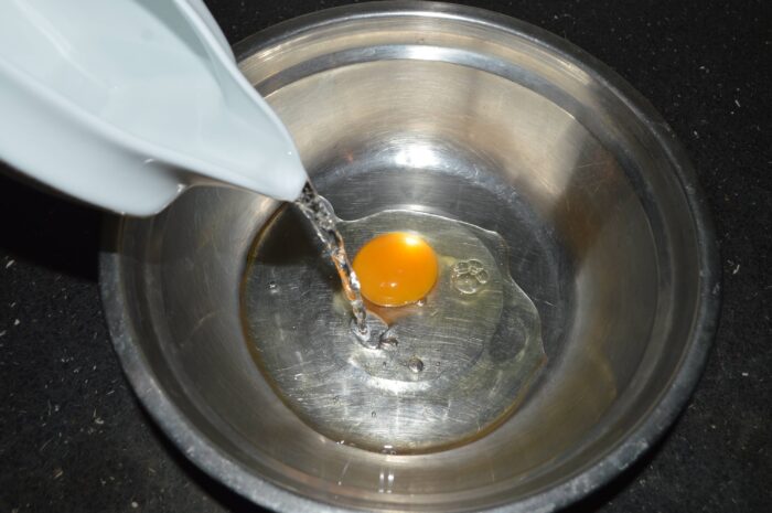 Break an egg into a bowl