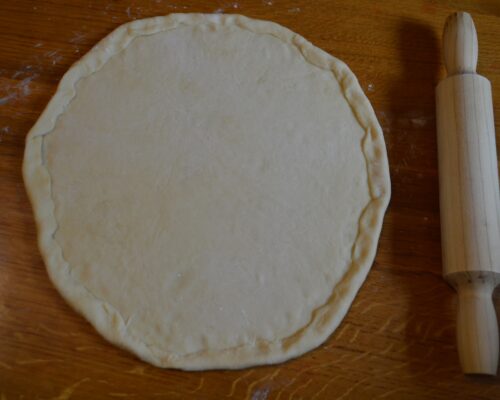 Use a rolling pin to roll out the dough