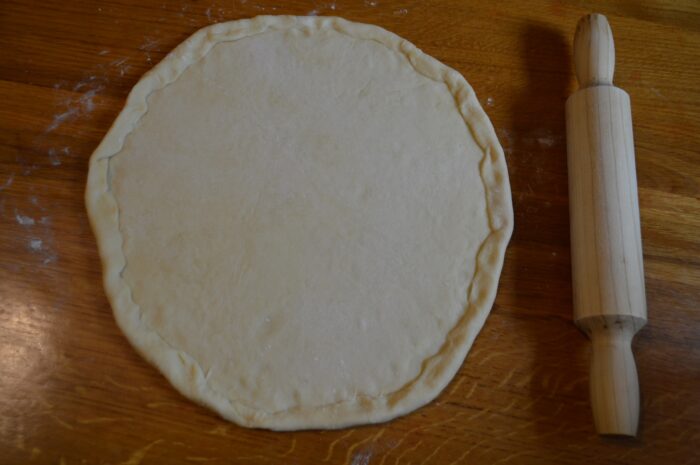 Use a rolling pin to roll out the dough