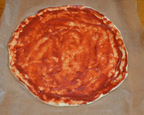 Spread the tomato paste