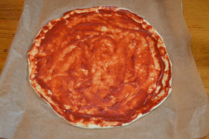 Spread the tomato paste