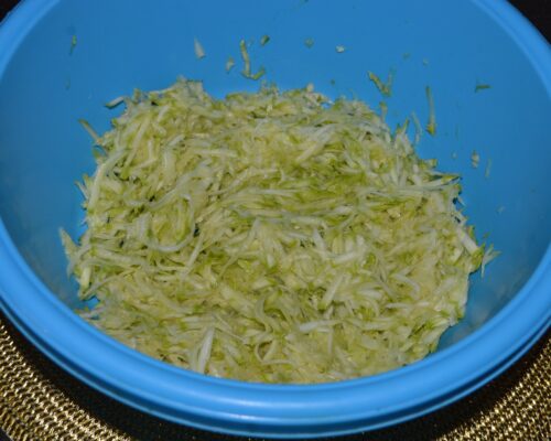 Grate the zucchini on a coarse grater