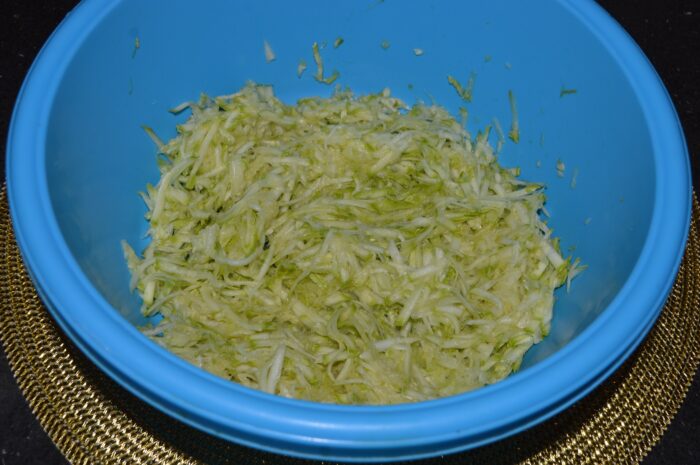Grate the zucchini on a coarse grater