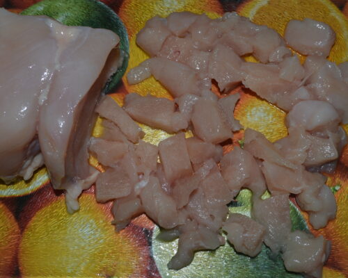 Chop the chicken breast finely