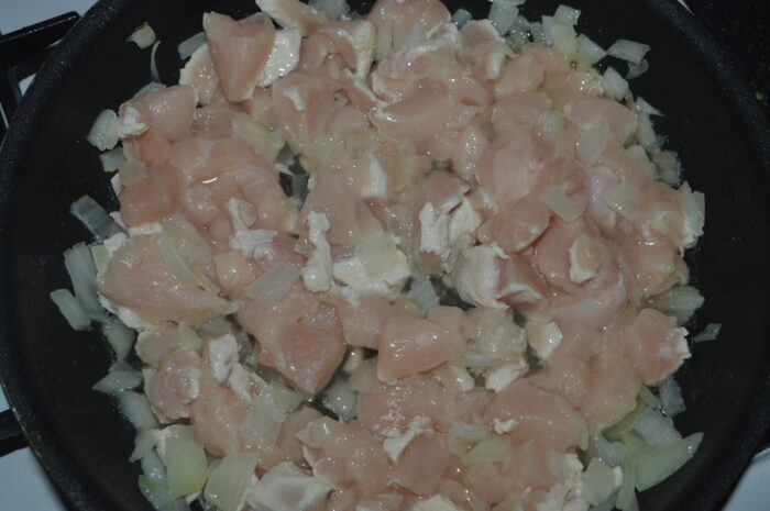 Add the chicken breast to the pan