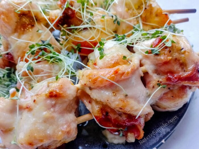 chicken bacon skewers showing golden bacon and juicy chicken