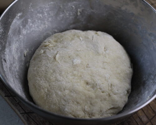 kneading the dough until elastic