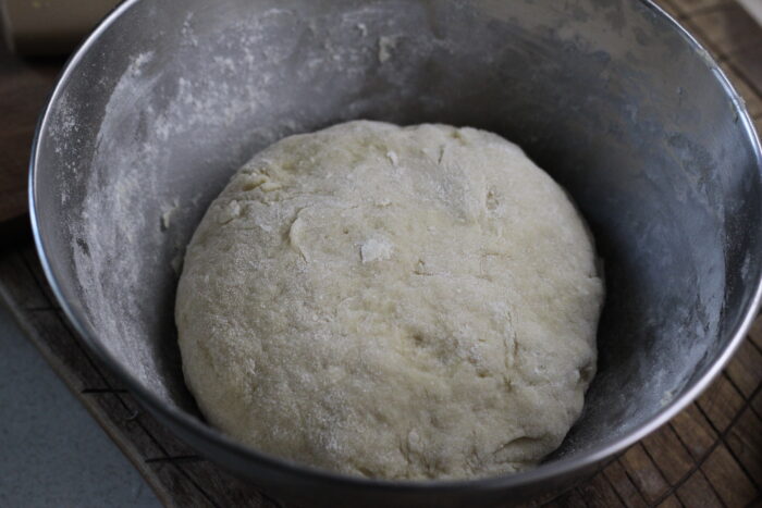 kneading the dough until elastic