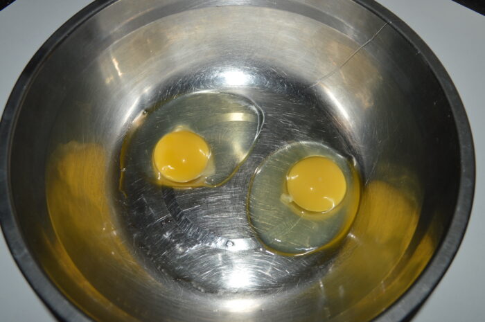 Break the eggs into a bowl