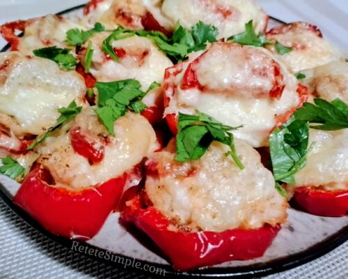 Family dinner setting with oven-baked pepper medallions as main dish