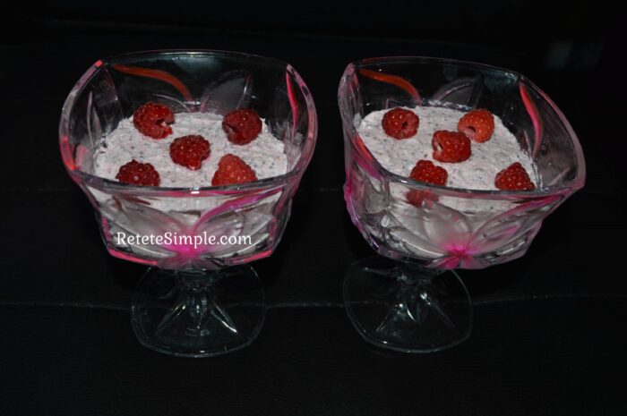 raspberry chia pudding with cottage cheese topped with fresh raspberries