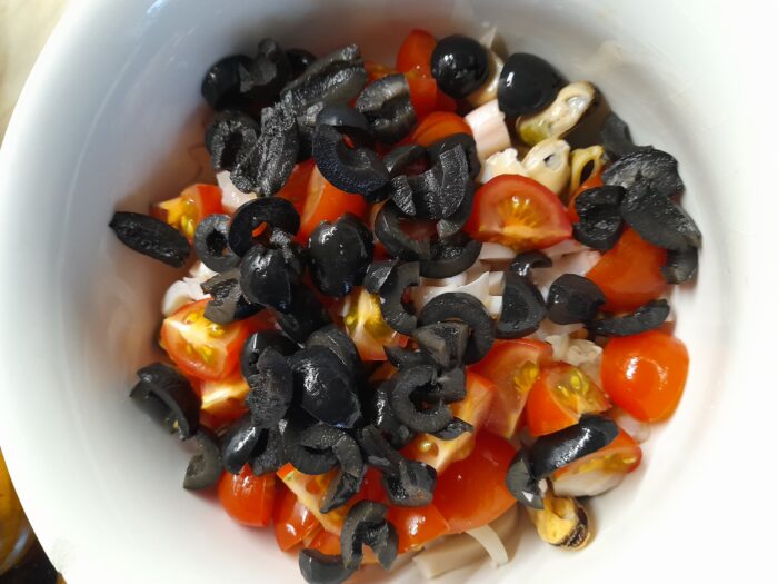 Add the olive slices