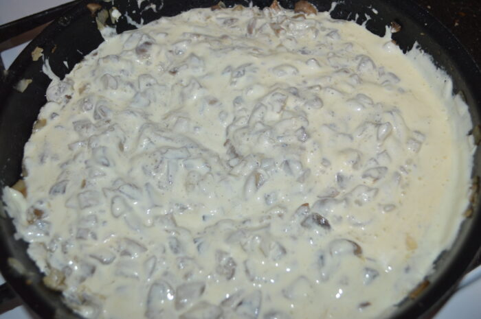 Pour the sour cream mixture into the pan