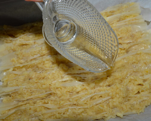 Pour the remaining oil over the sheets