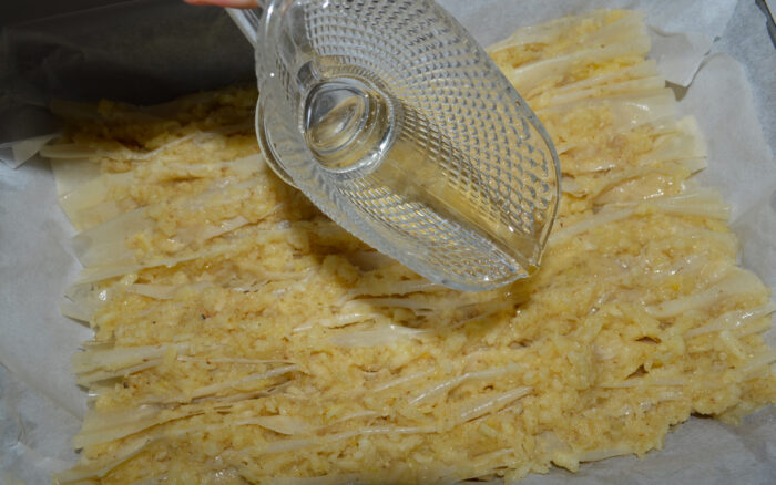 Pour the remaining oil over the sheets