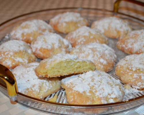 Side view of lemon cookie broken in half showing tender interior