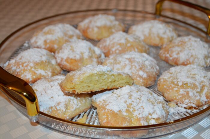Side view of lemon cookie broken in half showing tender interior