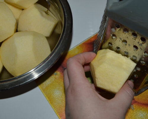 Peel the apples and grate