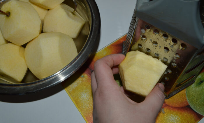 Peel the apples and grate