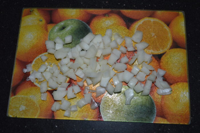 Chop the onion into cubes