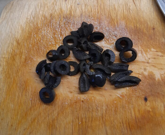 Slice the olives into rounds