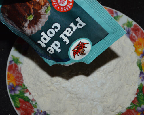 Stir the baking powder into the flour