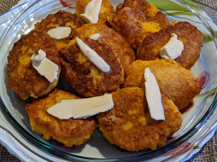 add thin slices of butter on top