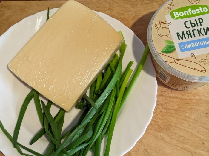 Grate the hard cheese