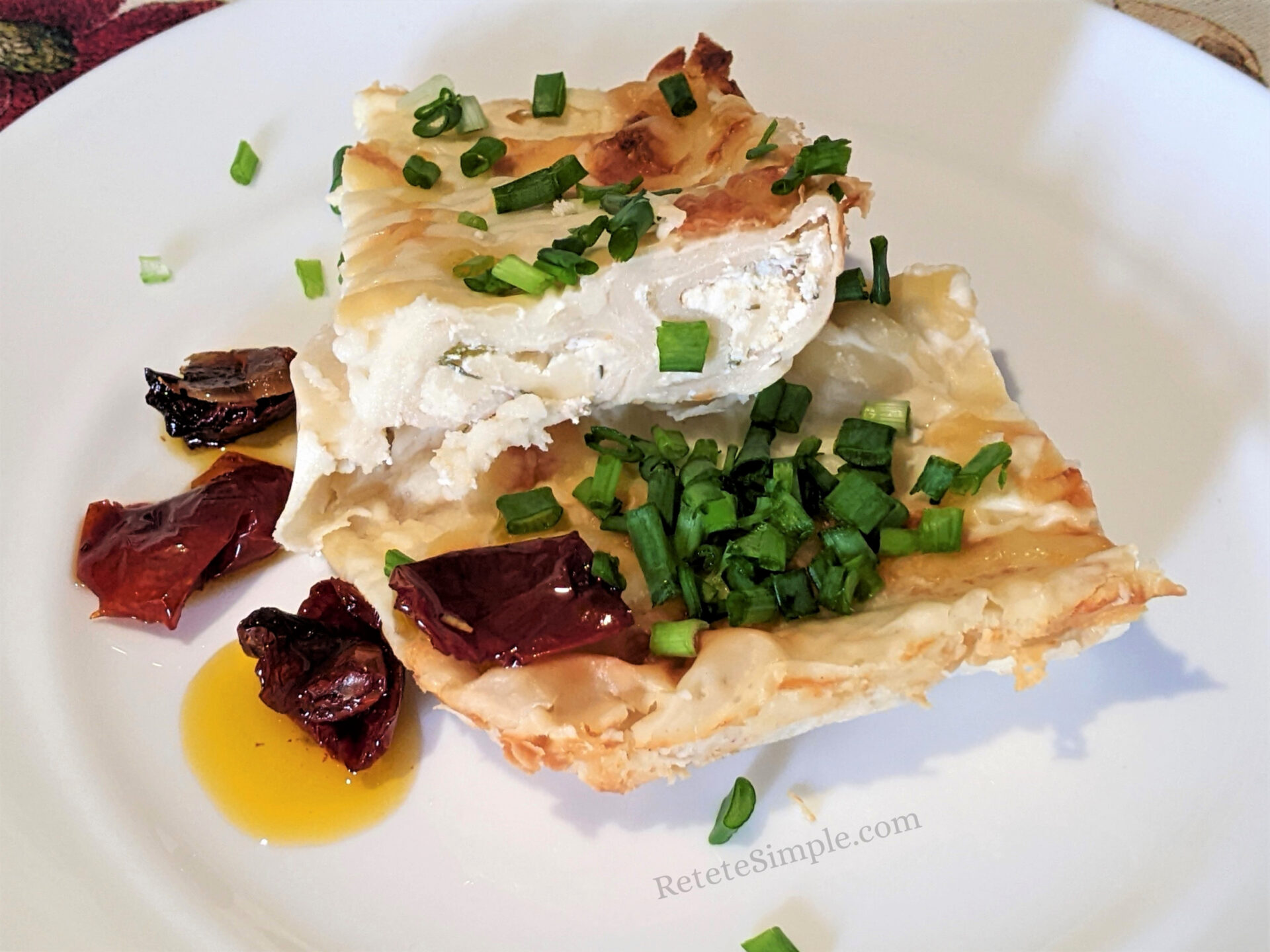 Baked Cheese-Filled Crepes in Bechamel Sauce photo