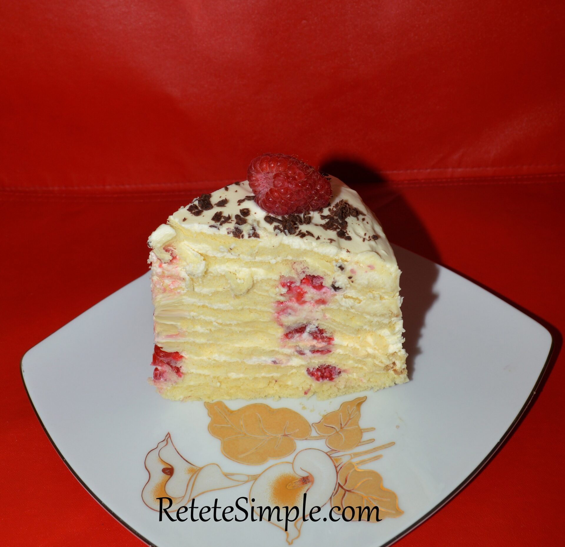 Slice of Milk-Girl Cake showing light layers and smooth cream inside