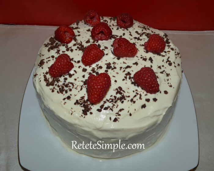 Milk-Girl Cake on white plate with layered sponge and creamy filling