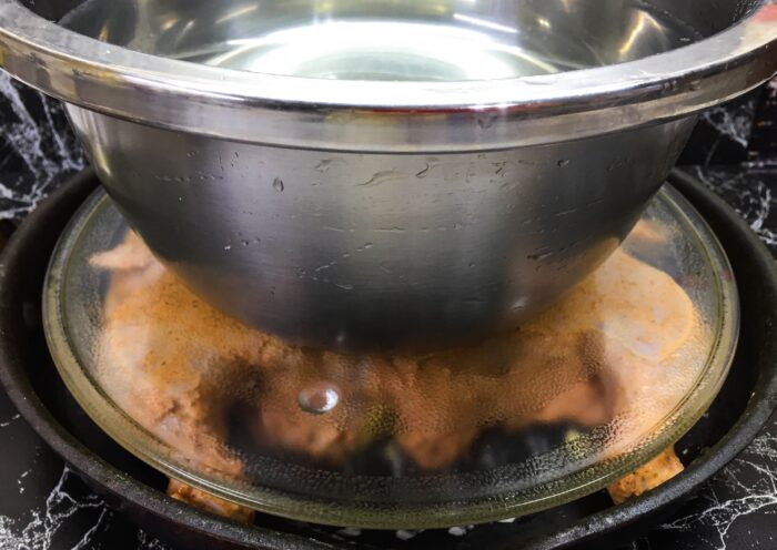 Place a weight on the plate