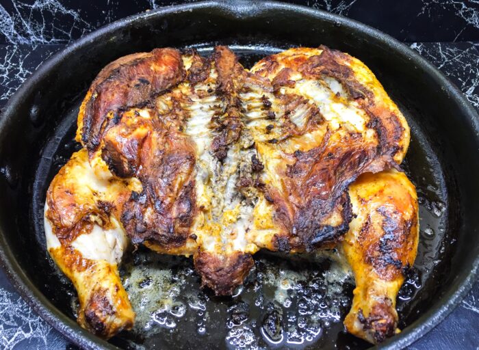 When the chicken is browned turn it